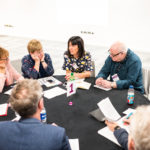 Group around a table at an event